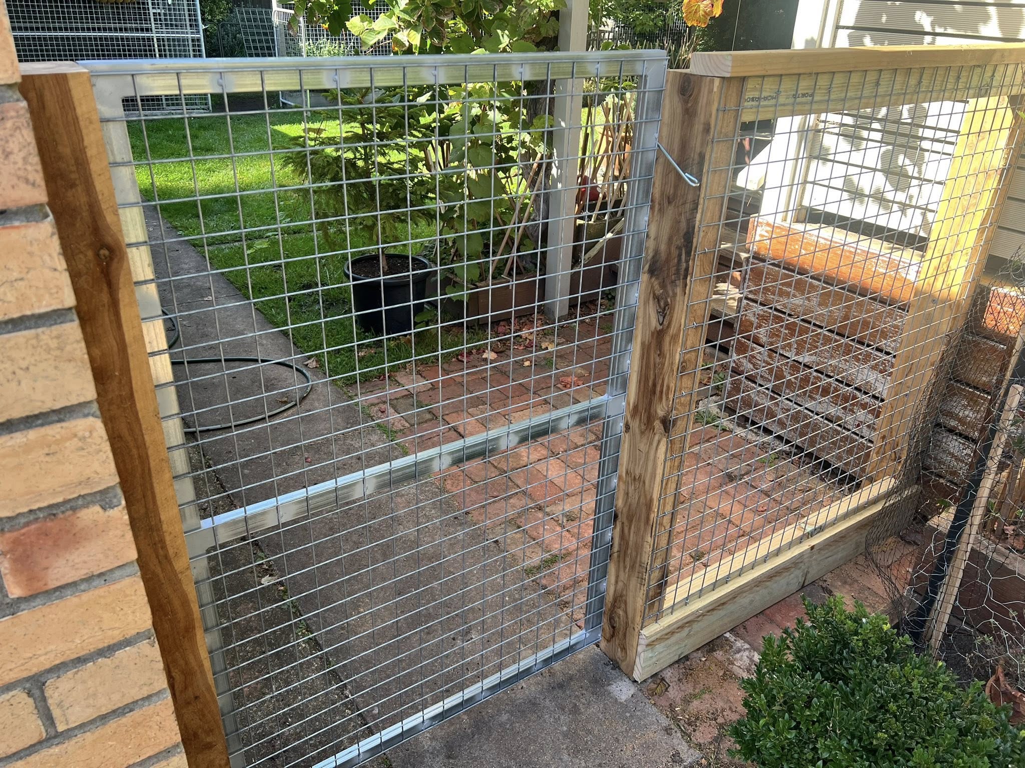 Emu wire mesh panels framing a productive garden