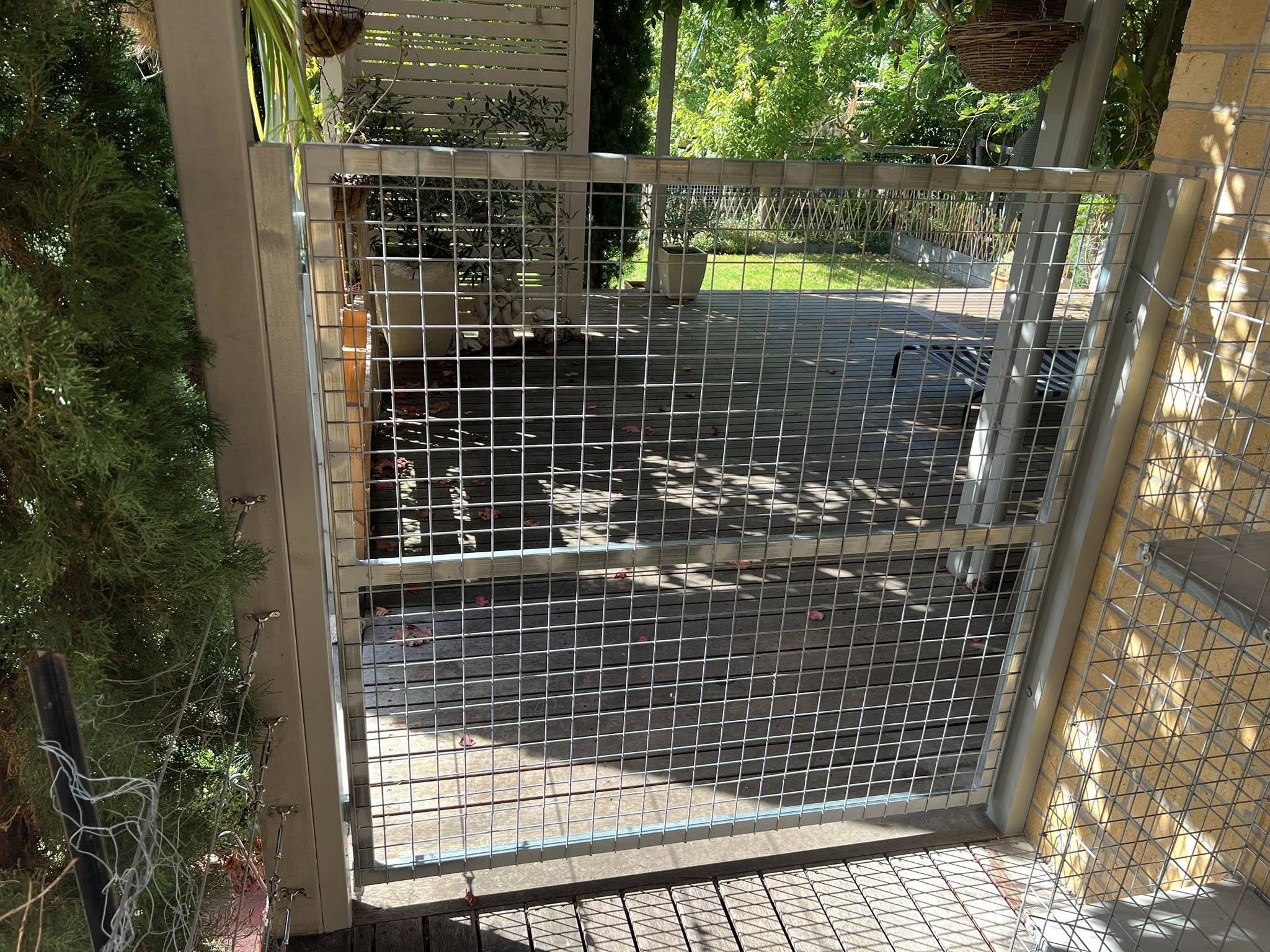 Emu wire mesh gate in a steel frame