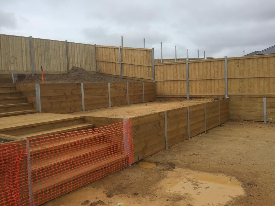 Tiered treated pine sleeper retaining walls